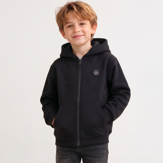 Smiling boy wearing a classic black 7-zone smart heated zip-up hoodie for winter